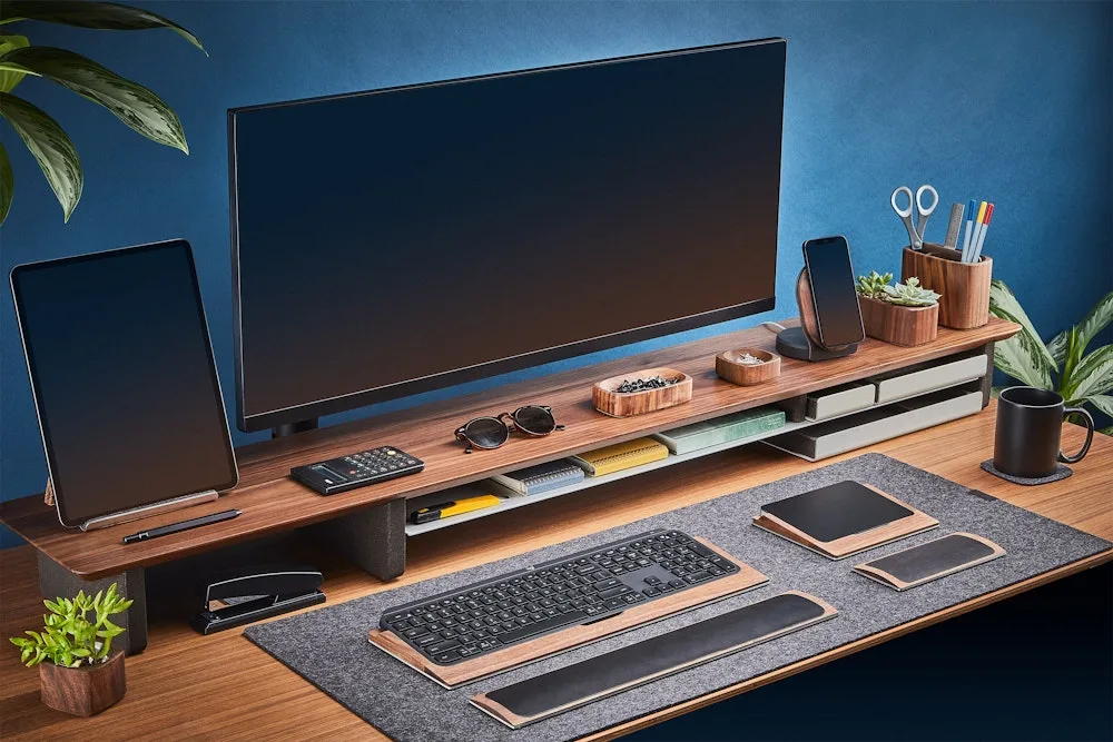 Grovemade's product page showing the wooden desk shelf system with monitor and keyboard